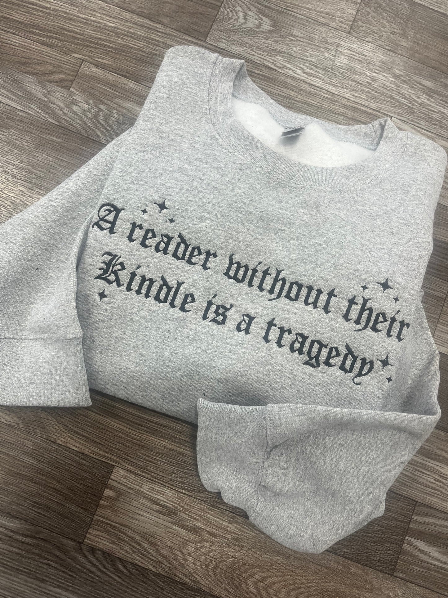 A Reader Without A Kindle Crewneck