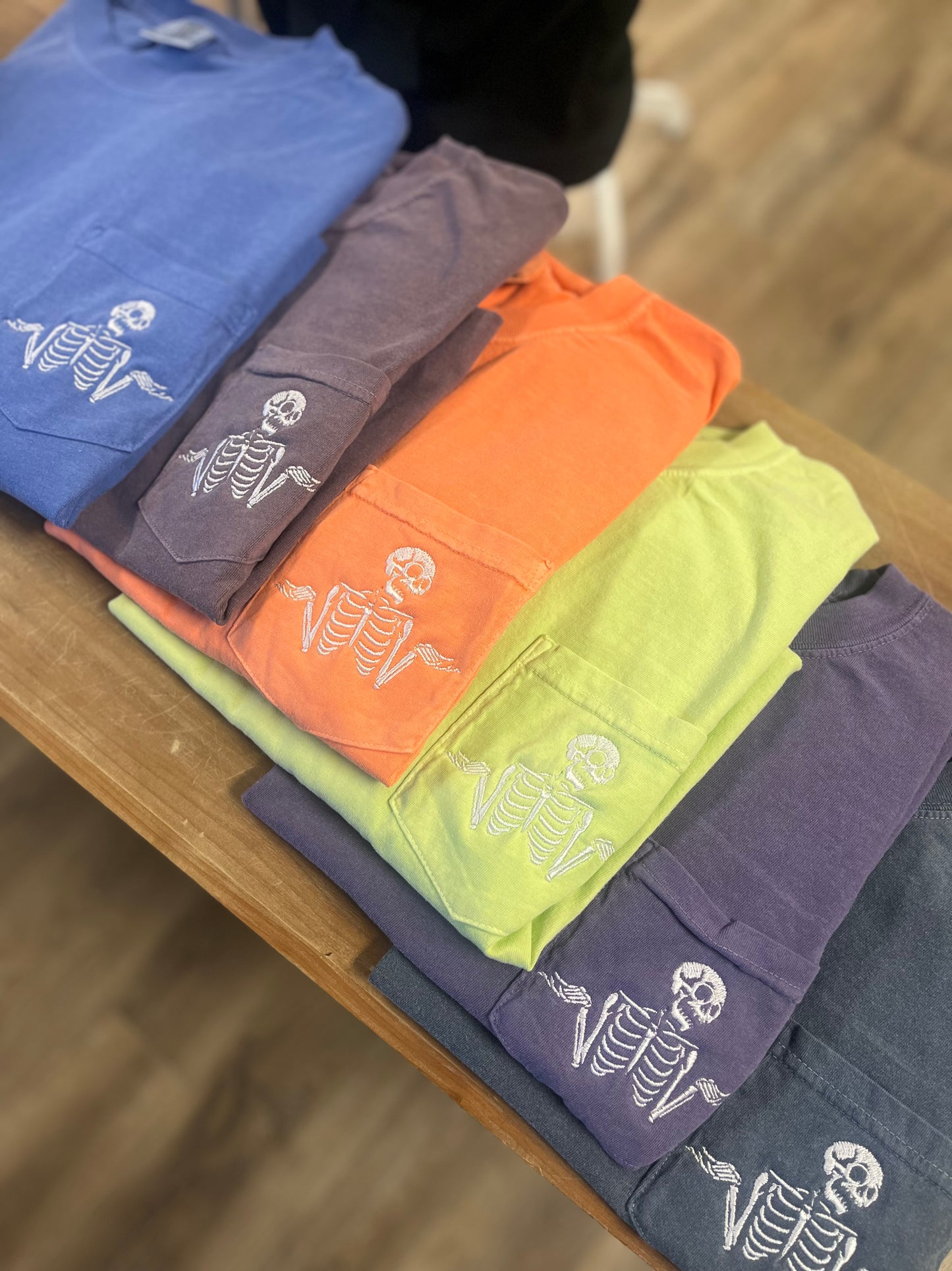 Shrugging Skeleton Pocket Tshirt