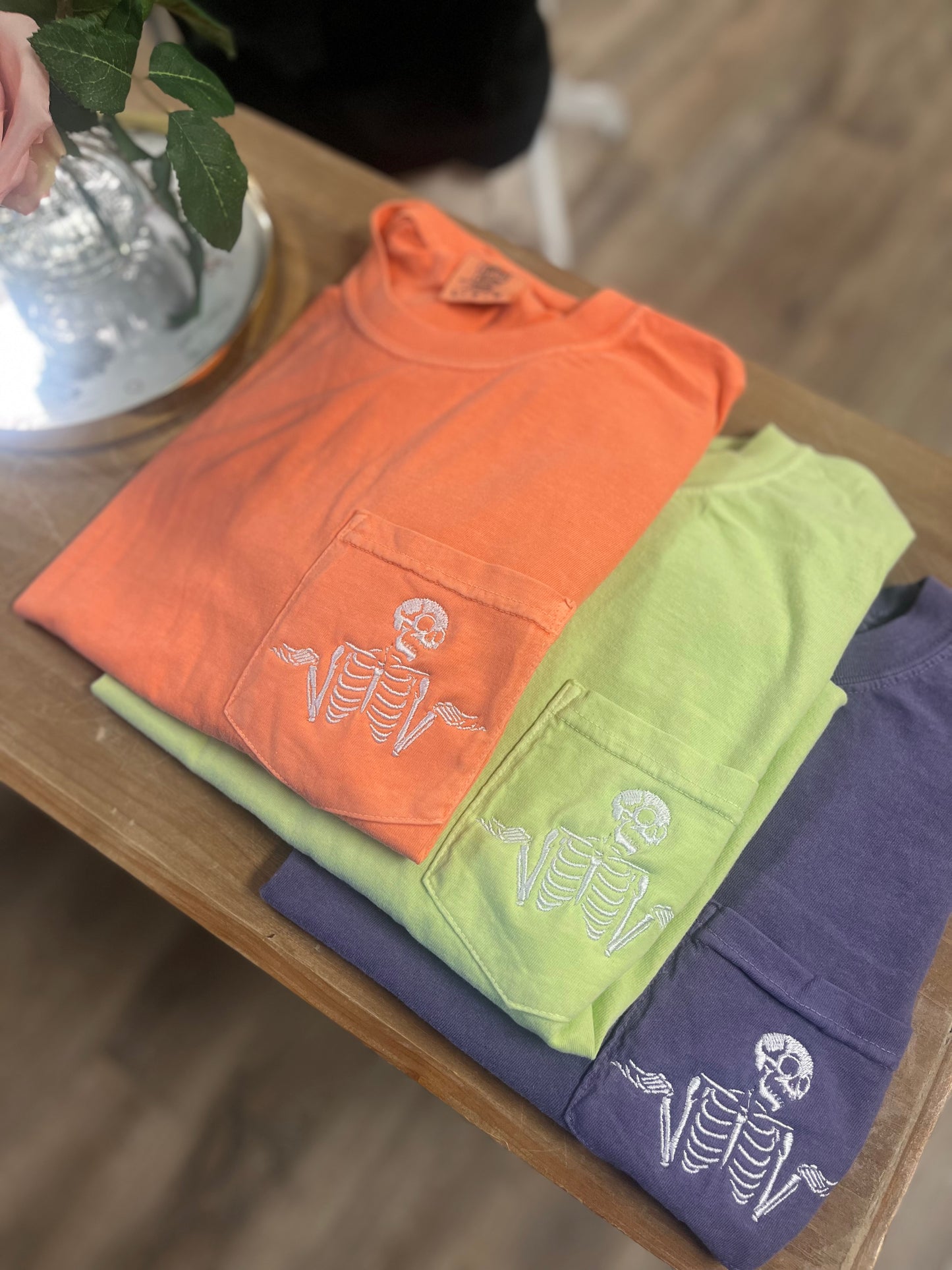 Shrugging Skeleton Pocket Tshirt